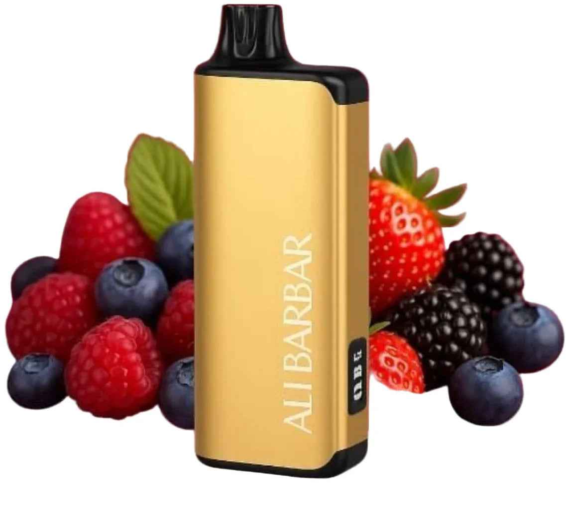 Gold vape device with fresh berries, including strawberries, raspberries, blueberries, and blackberries.